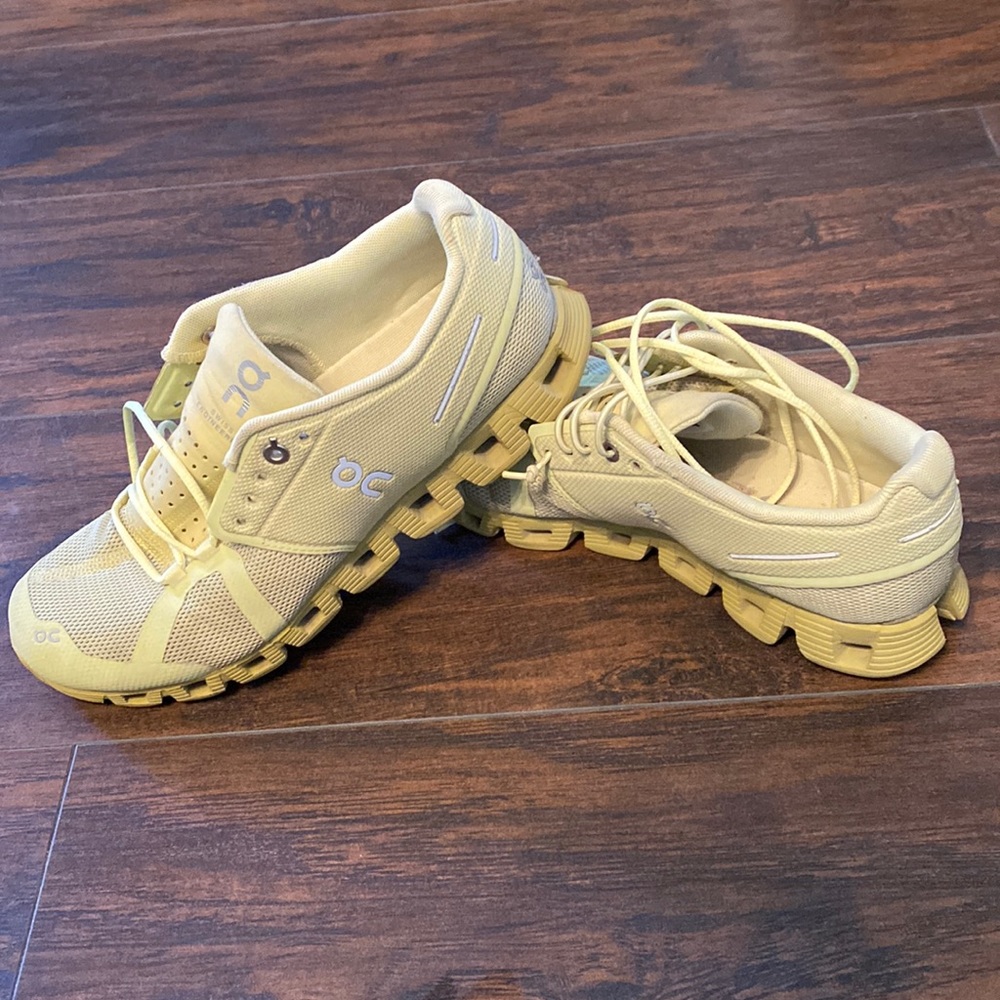 Yellow oncloud running shoes w only the long shoe strings